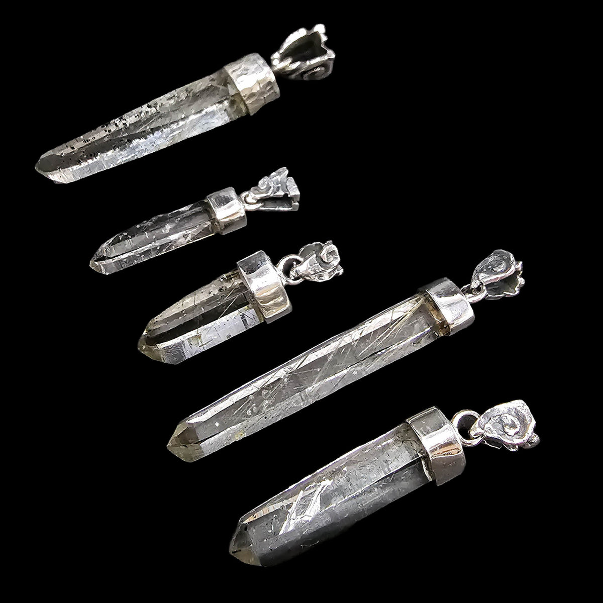 Actinolite quartz capped pendant, BC: several capped points