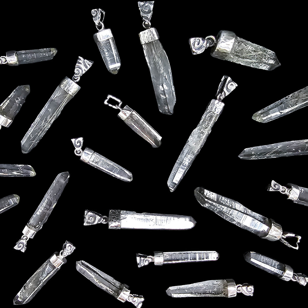 Actinolite quartz capped pendant, BC: scatter of pendants