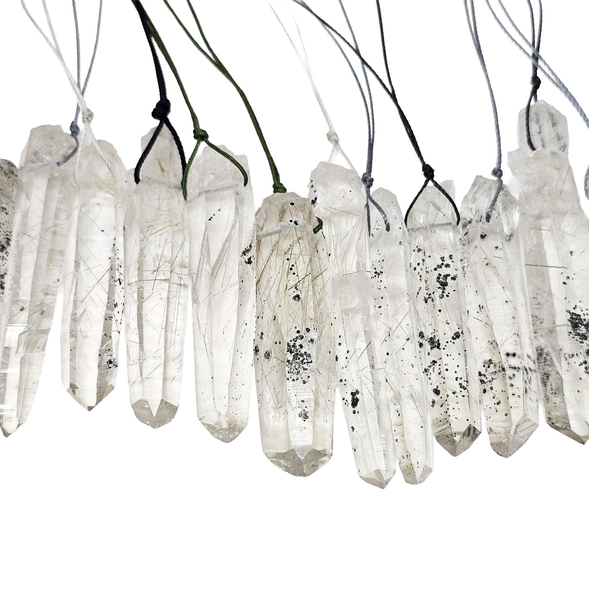 Actinolite quartz drilled pendant, BC: row of hanging points