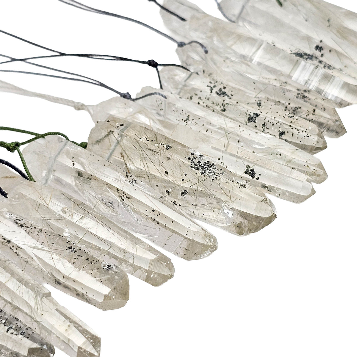 Actinolite quartz drilled pendant, BC: close view of drilled points