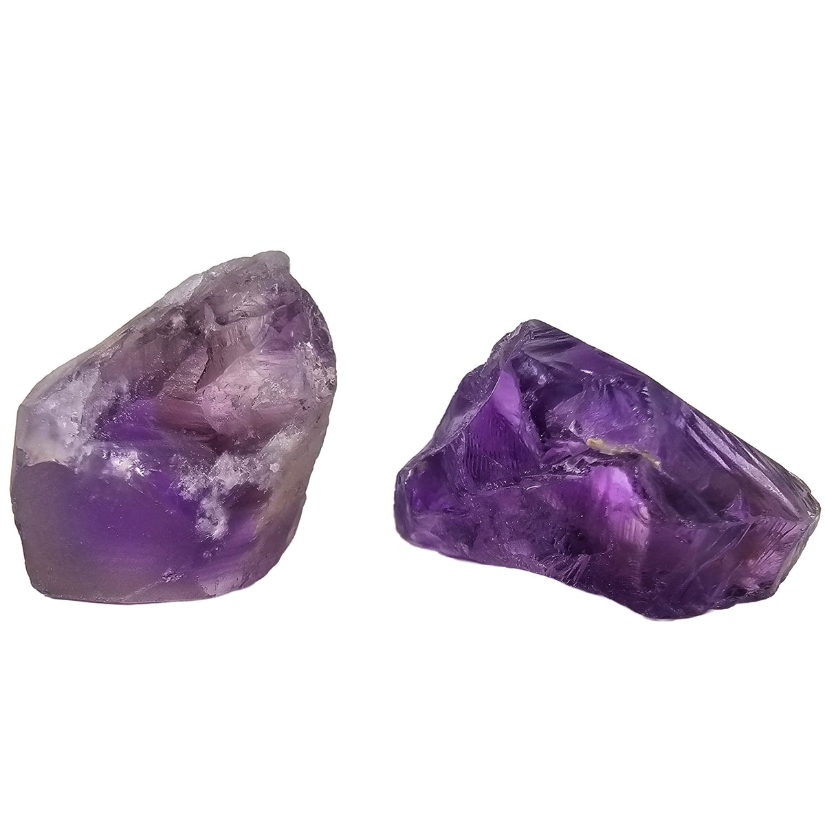 Gem grade amethyst rough from Brazil – two pieces