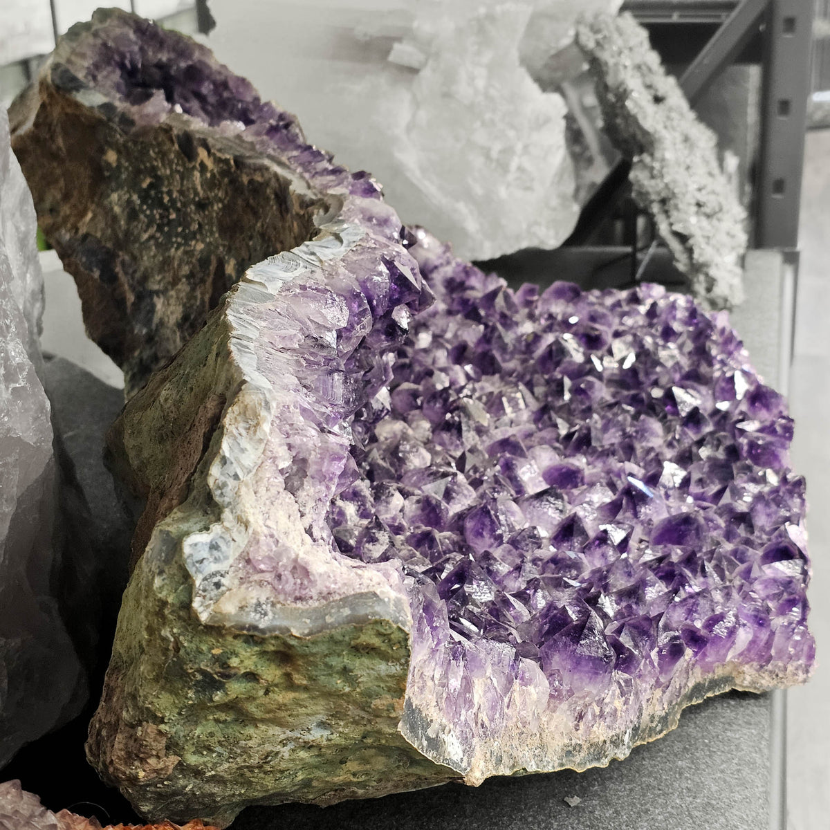Amethyst half-moon geode statement specimen, a variety of quartz.