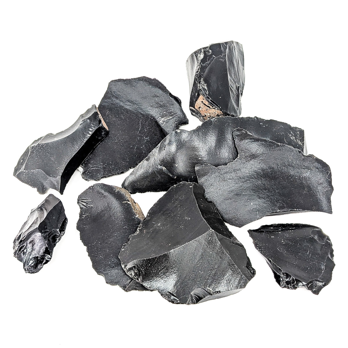 Black butter obsidian rough from Oregon – pile of pieces