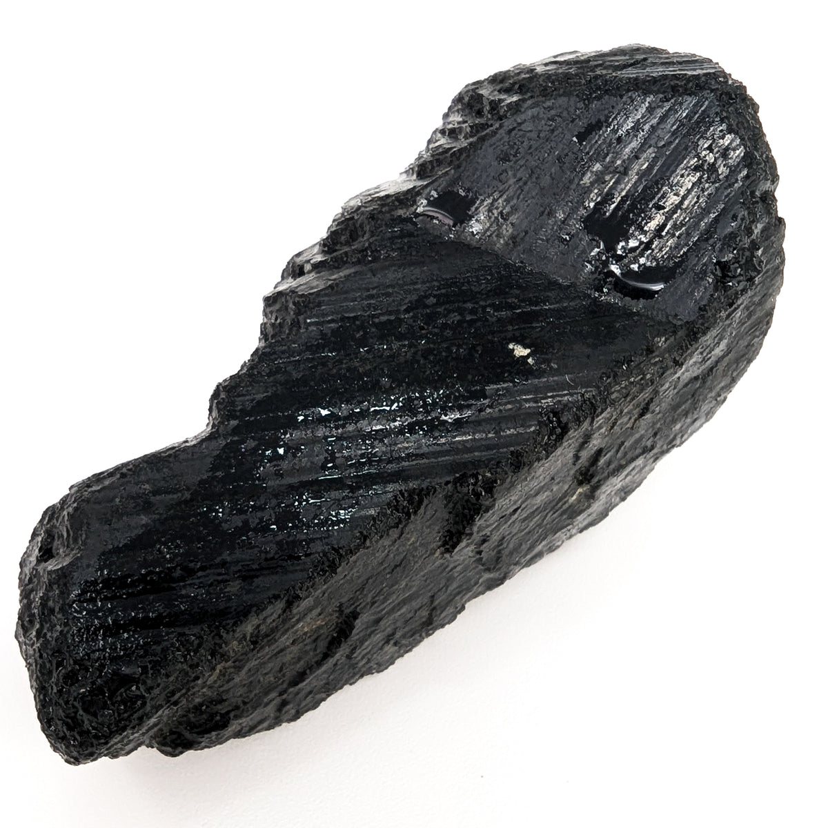 Black tourmaline (schorl) rough from Madagascar, opaque striated columnar crystal material