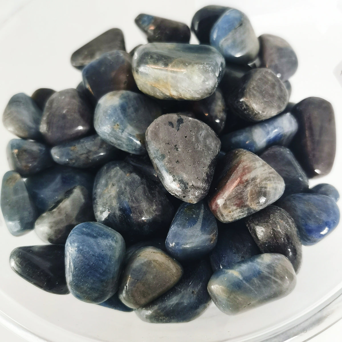 Blue Sapphire tumble, a variety of corundum, from India.