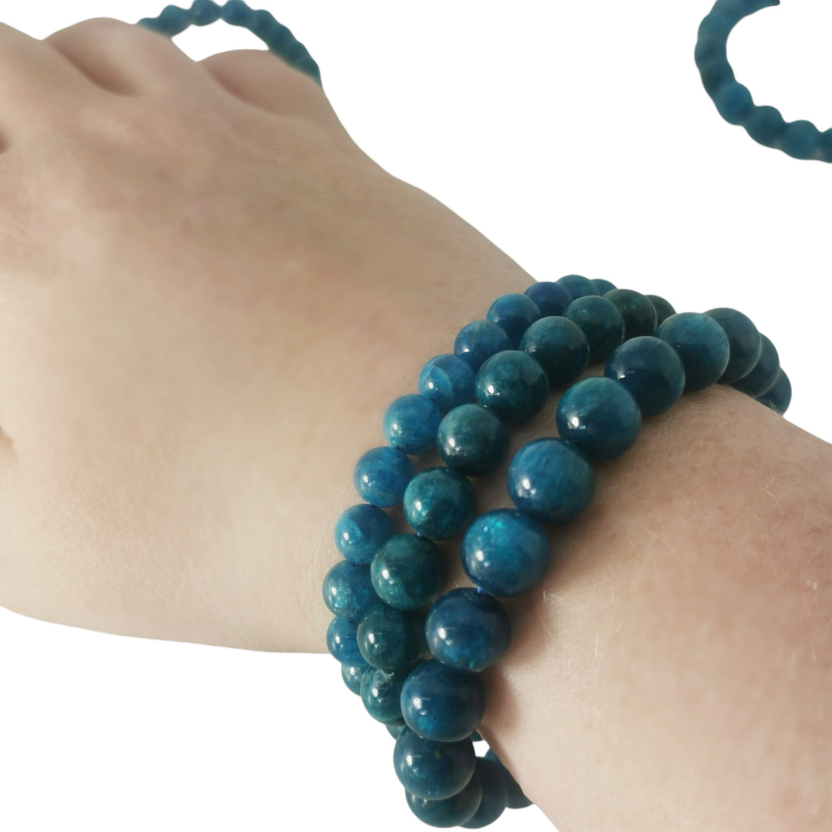 Blue apatite round bead bracelet – bracelets worn on a wrist