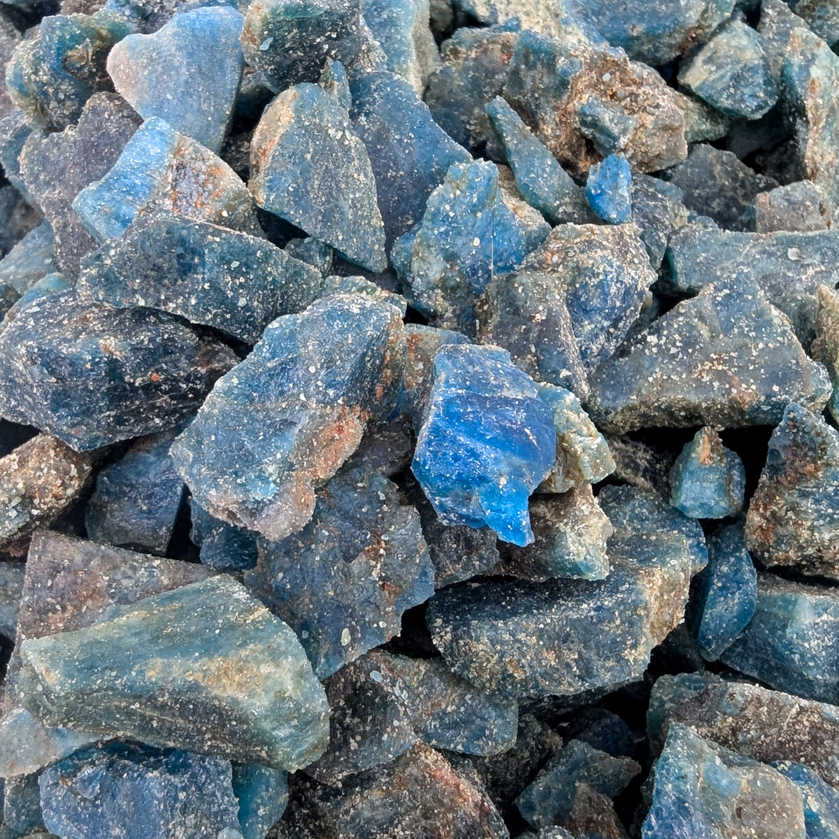 Blue apatite rough from Madagascar – close-up of many pieces