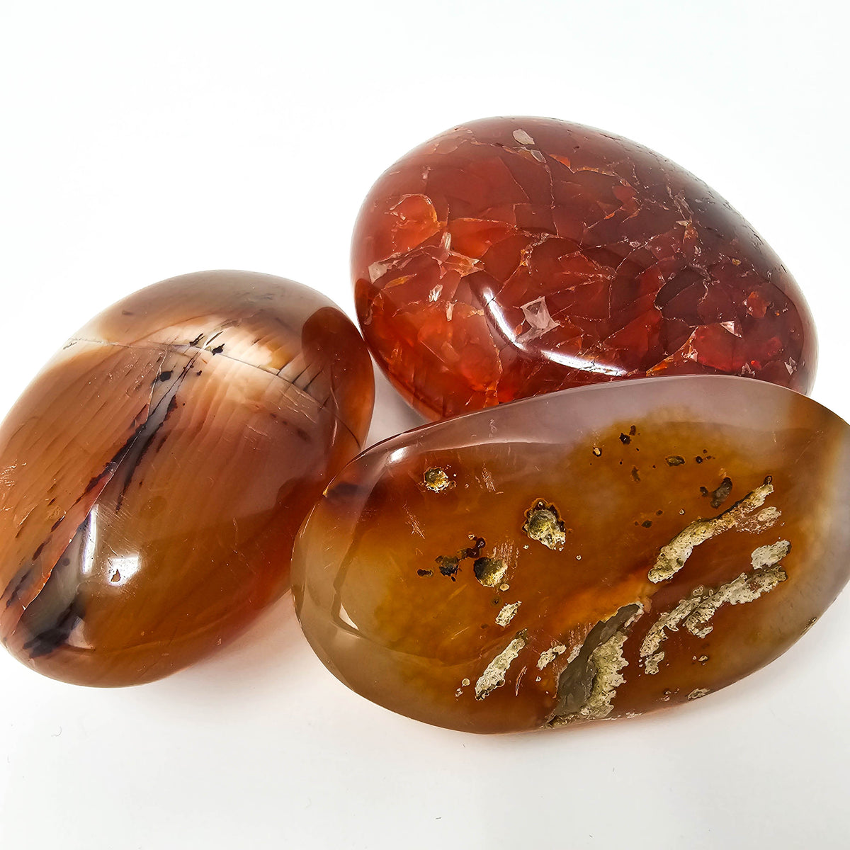 Carnelian palmstone, a variety of chalcedony, from Madagascar.