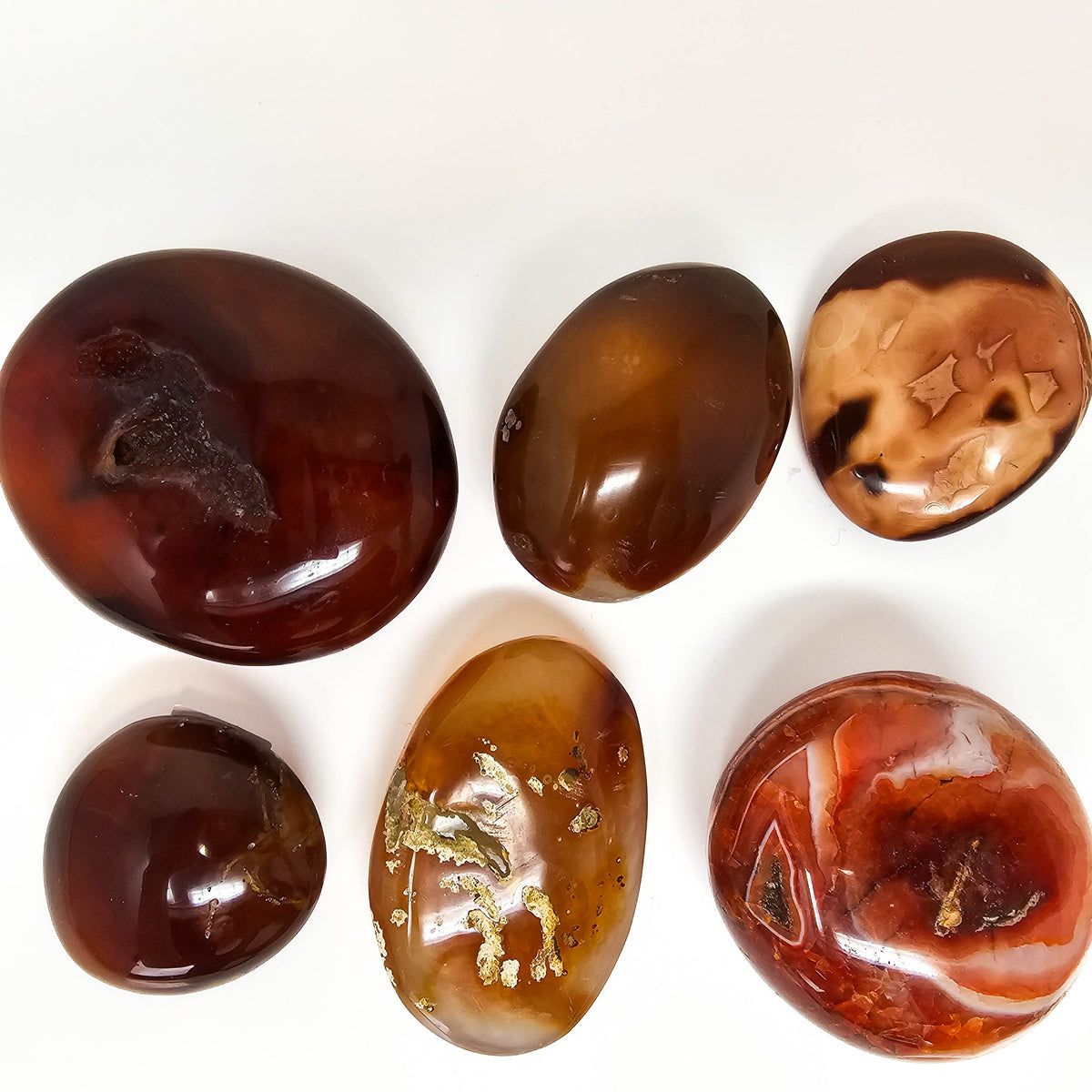 Carnelian palmstone, a variety of chalcedony, from Madagascar.