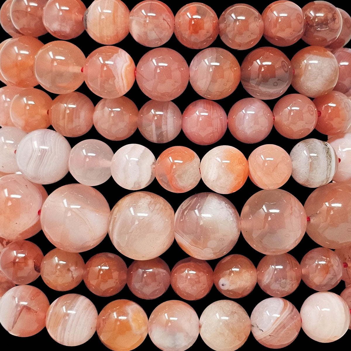 Carnelian Parallax Agate round bead bracelet.