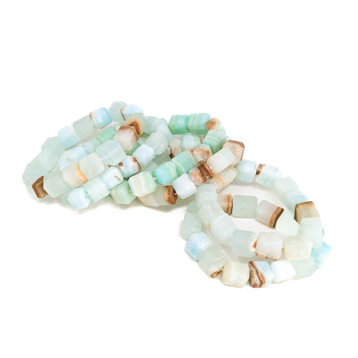 Caribbean calcite bead bracelet – pile of bracelets