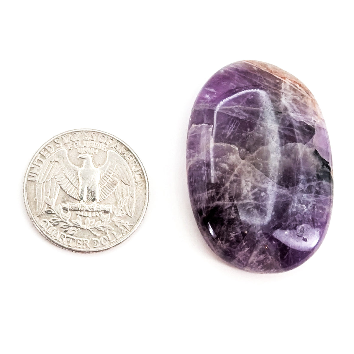 Chevron Amethyst worry stone, a variety of quartz, from Madagascar.