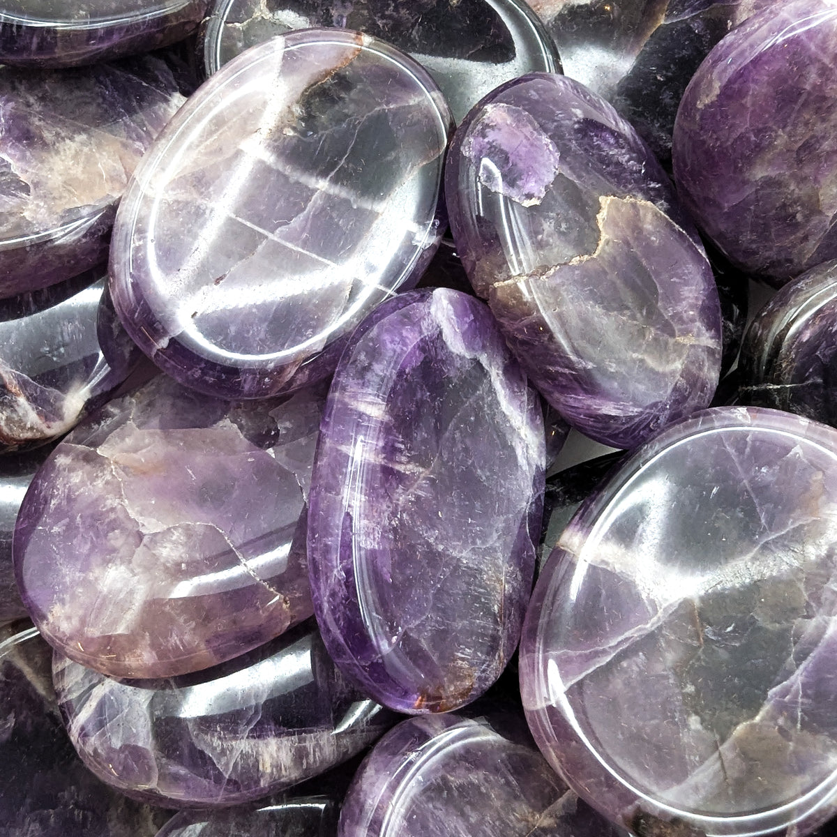 Chevron Amethyst worry stone, a variety of quartz, from Madagascar.