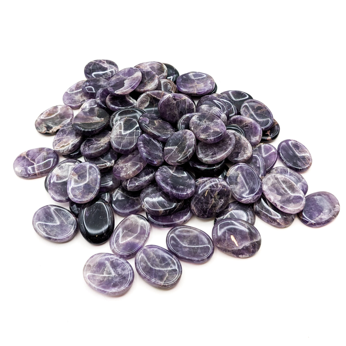 Chevron Amethyst worry stone, a variety of quartz, from Madagascar.