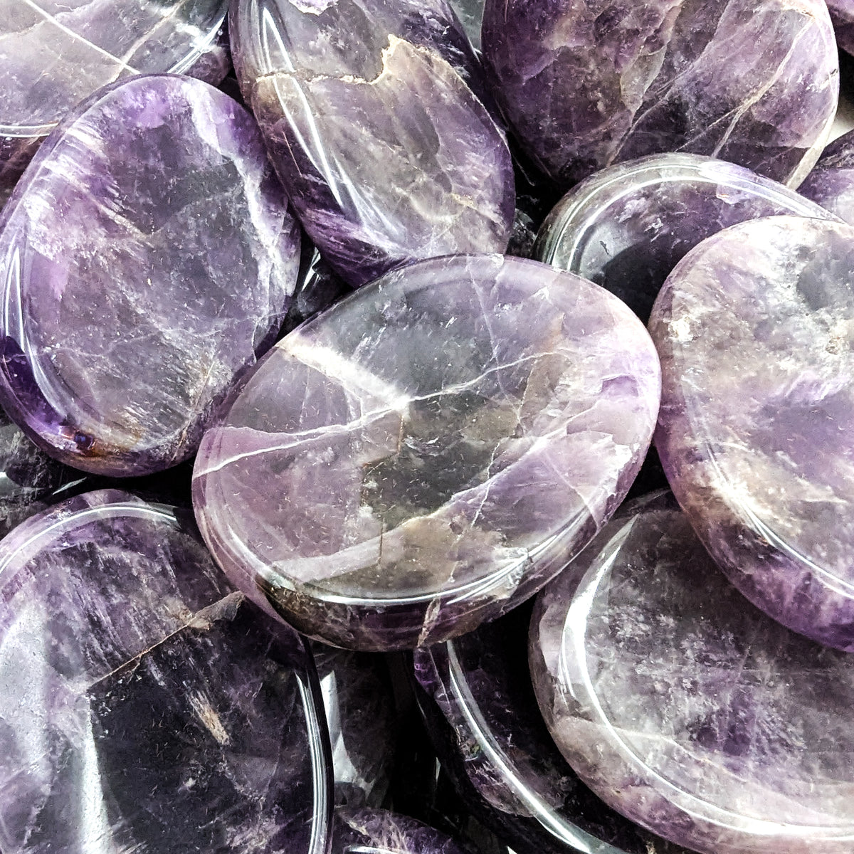Chevron Amethyst worry stone, a variety of quartz, from Madagascar.