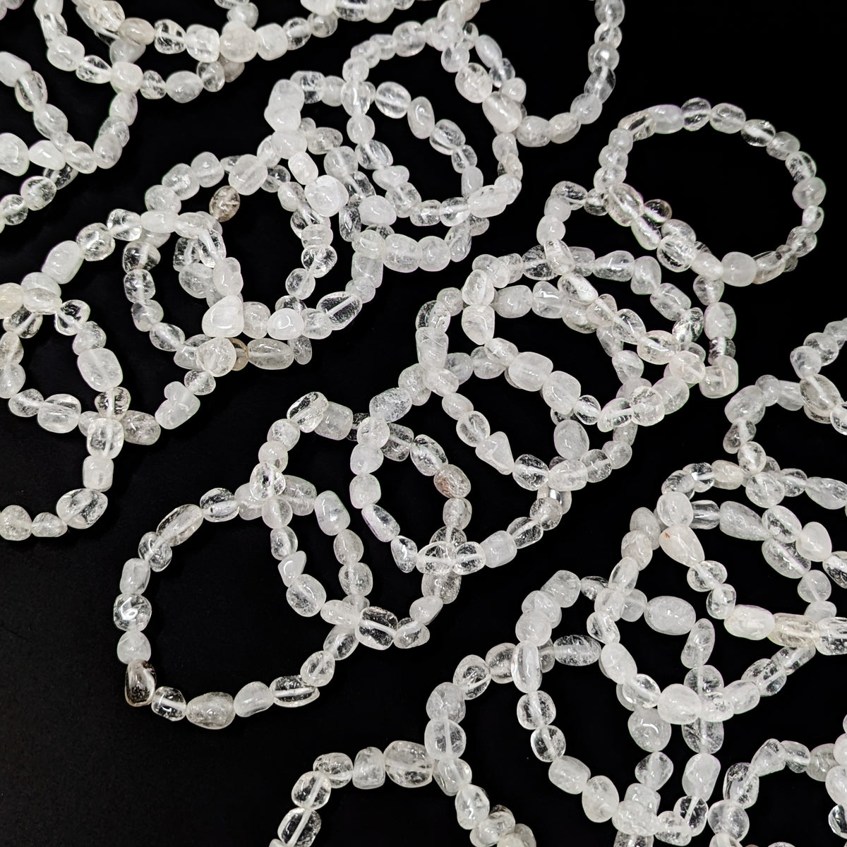 Clear quartz tumble bead bracelet – many bracelets