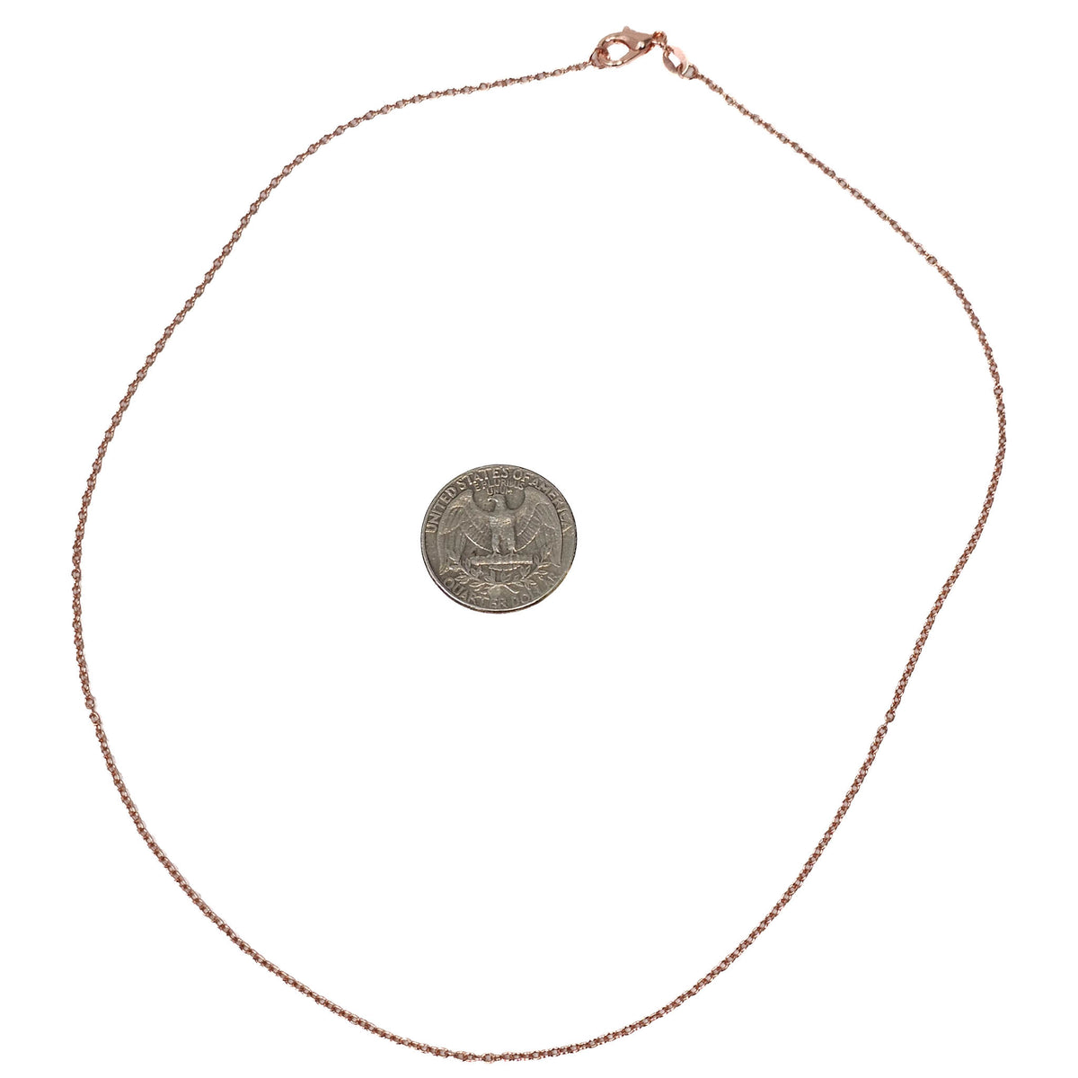 Copper plated chain – chain beside a coin for scale
