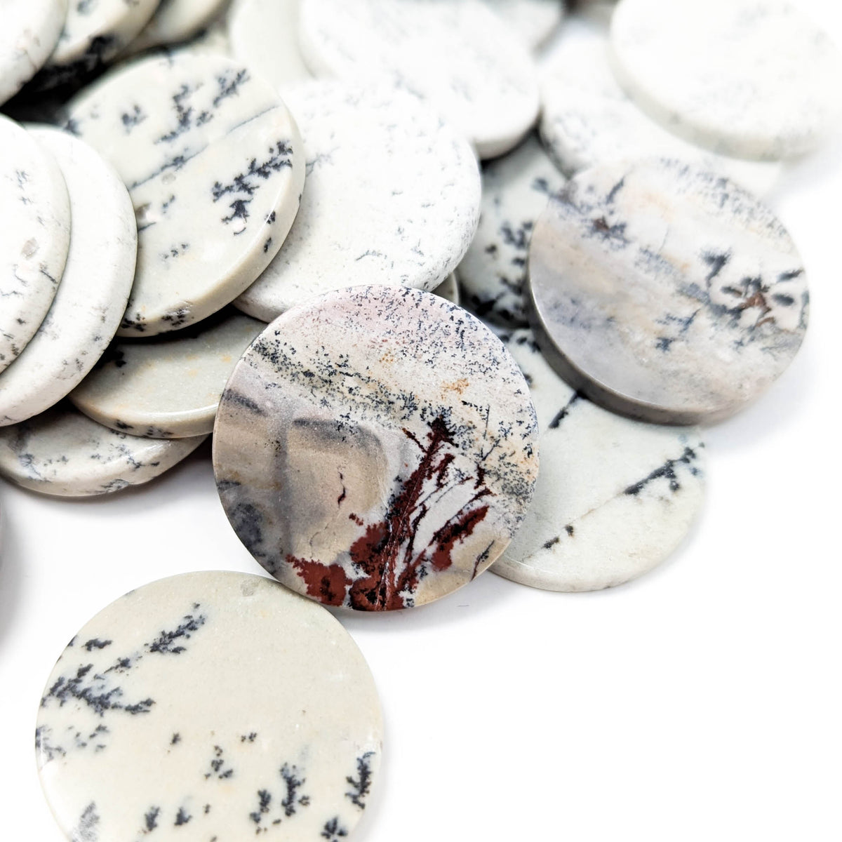 Dendritic Agate flat disk, a variety of chalcedony.