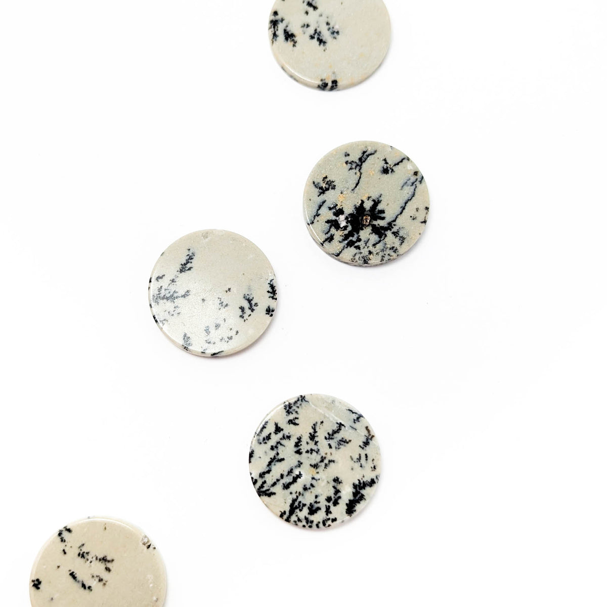 Dendritic Agate flat disk, a variety of chalcedony.
