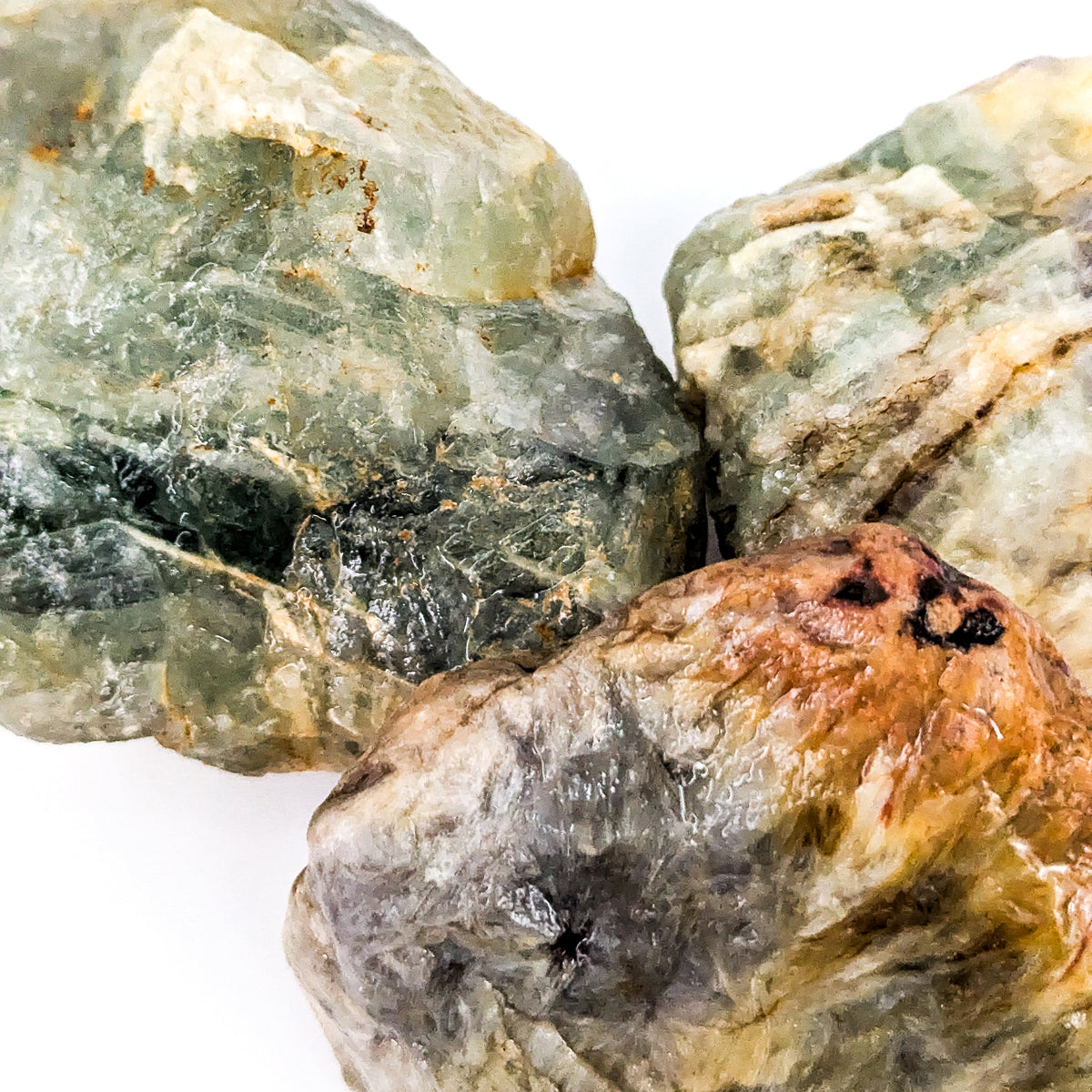Fluorite rough from Kelowna, BC – close-up of three pieces