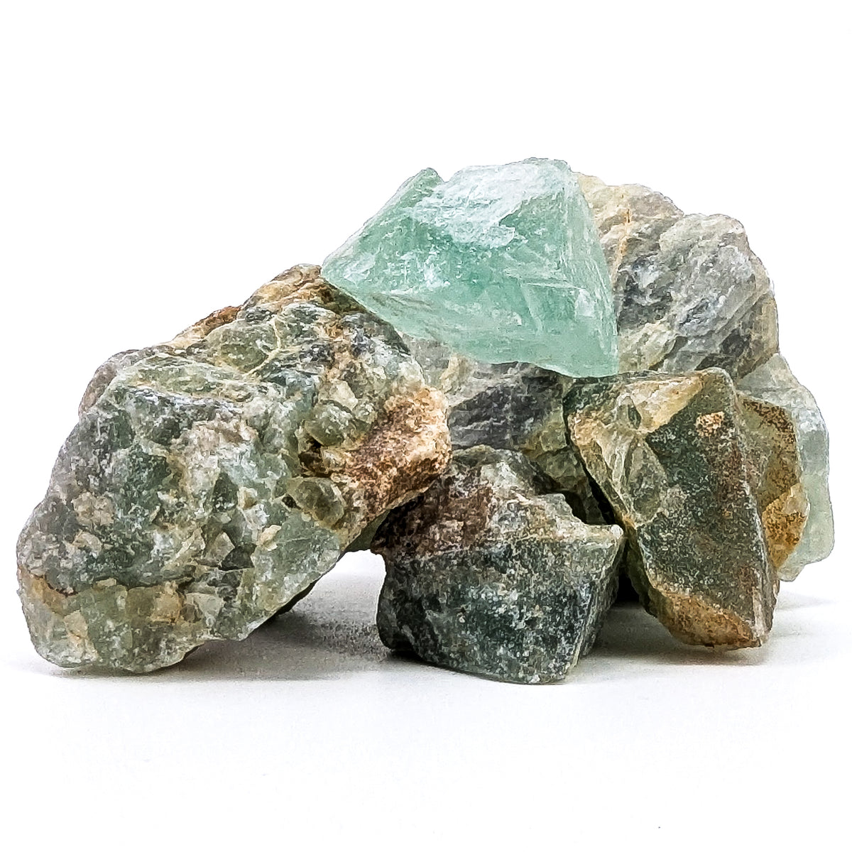Fluorite rough from Kelowna, BC – dark pile with green piece