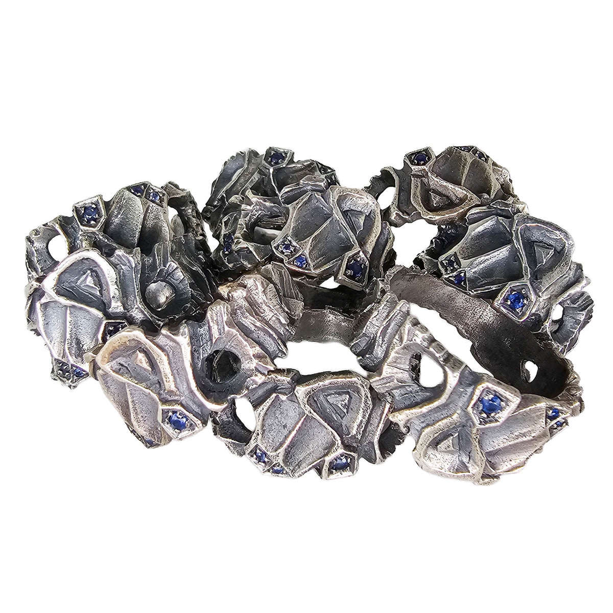 Hydrus free flow ring with Blue Sapphire.
