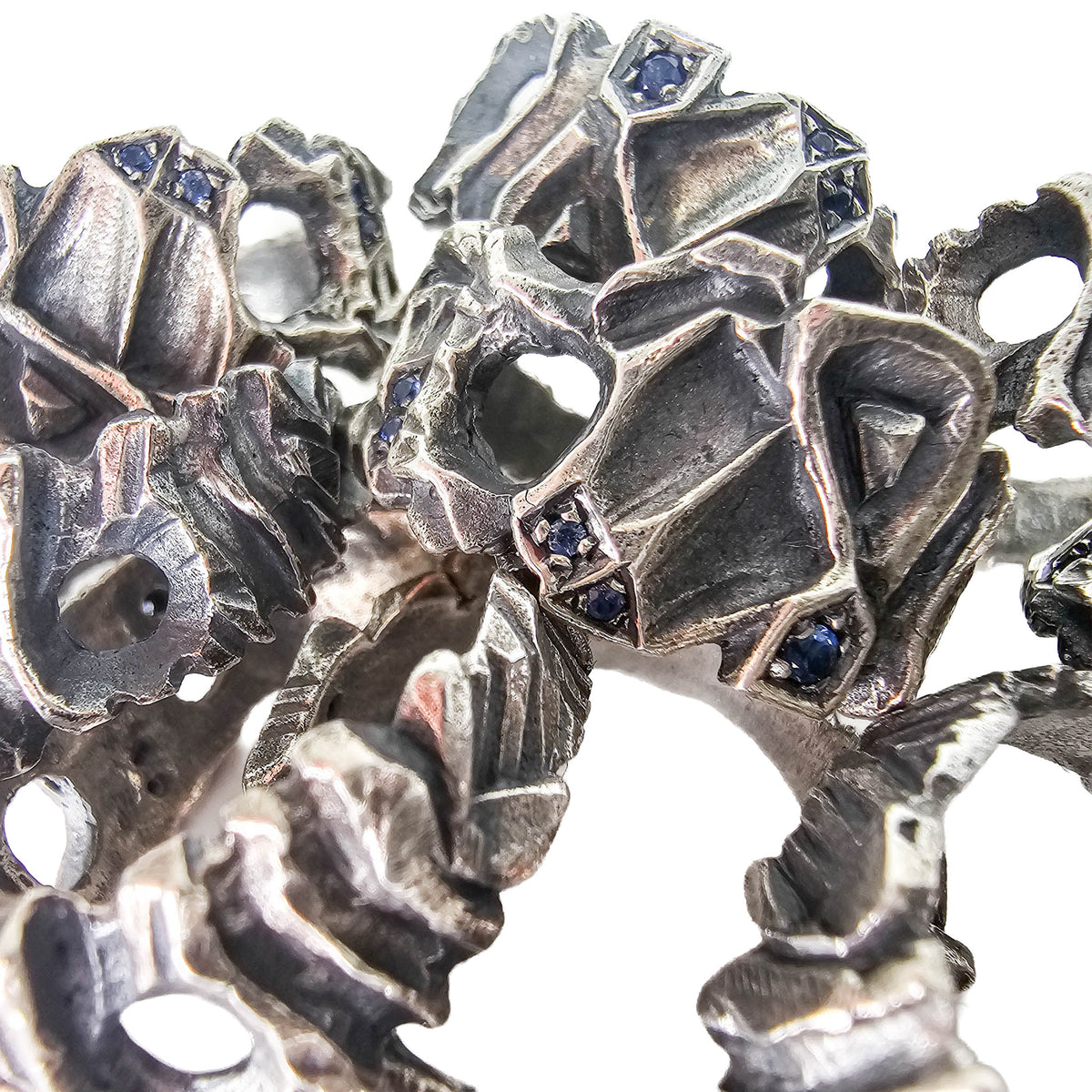 Hydrus free flow ring with Blue Sapphire.