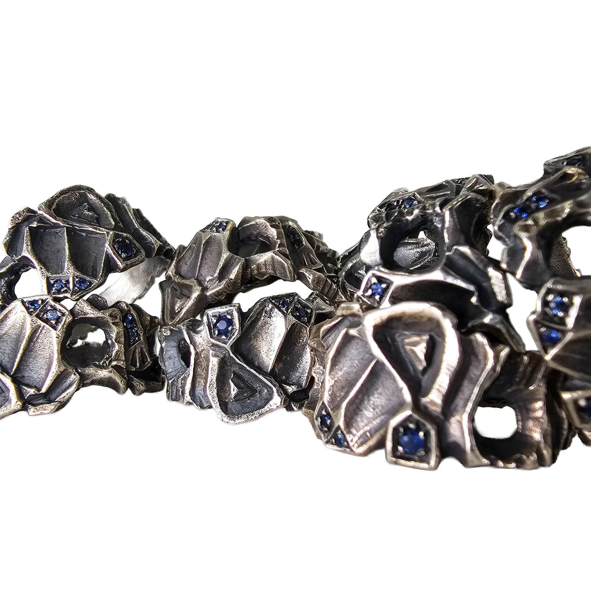 Hydrus free flow ring with Blue Sapphire.