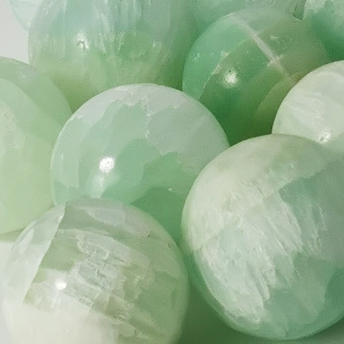 Pistachio Calcite mini sphere, calcium carbonate.