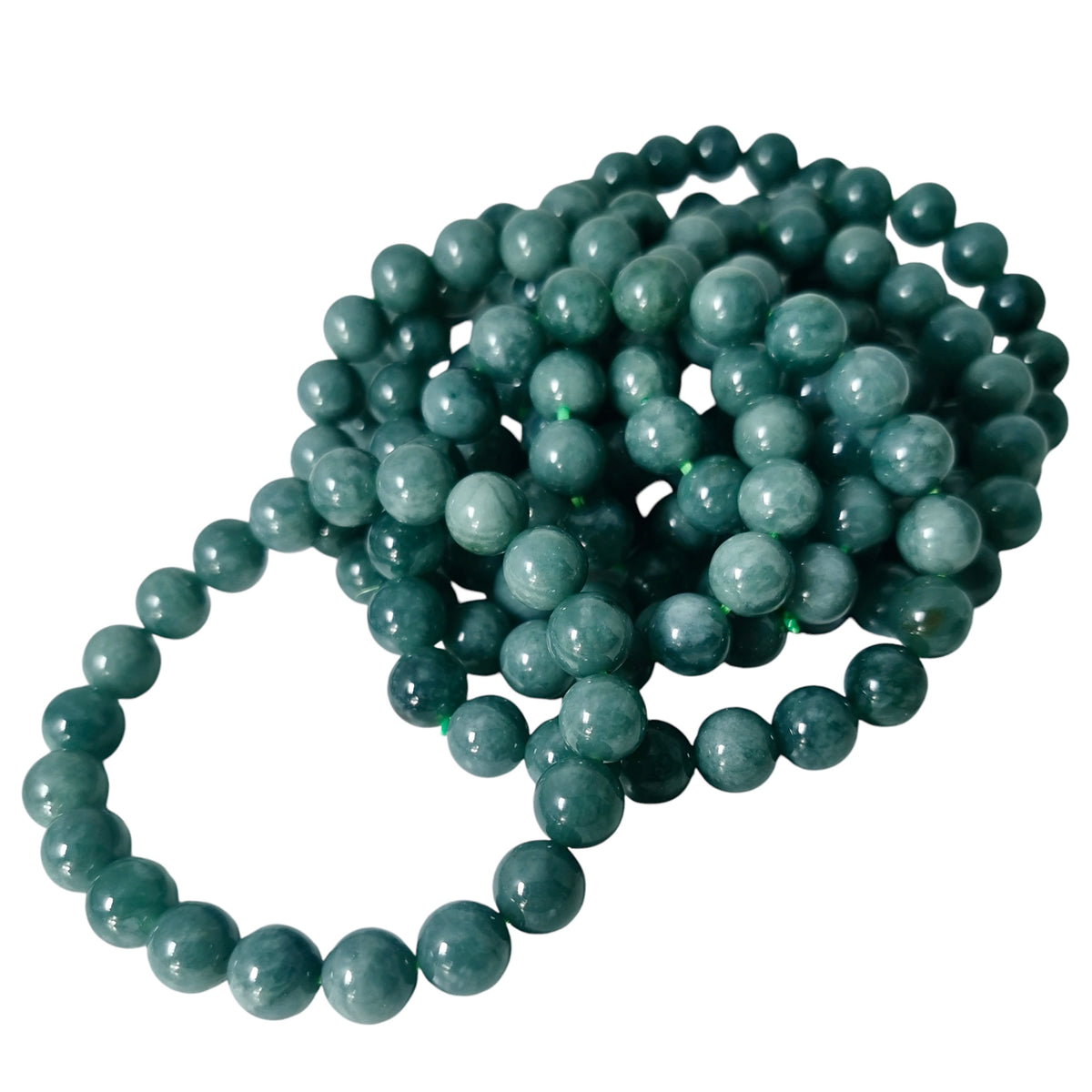 Jadeite bead bracelet from Guatemala – pile of bracelets