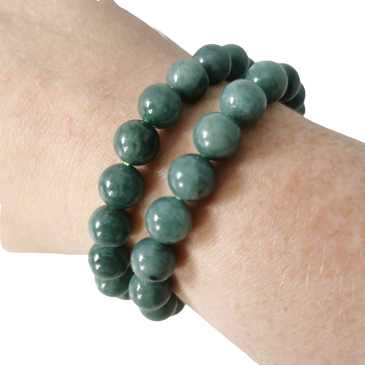 Jadeite bead bracelet from Guatemala – two bracelets on a wrist