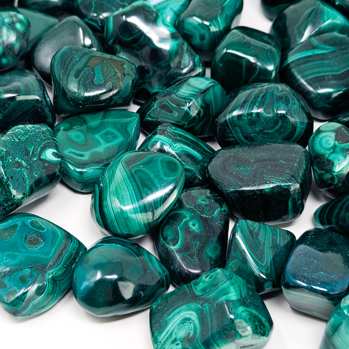 Malachite tumble, a copper carbonate.