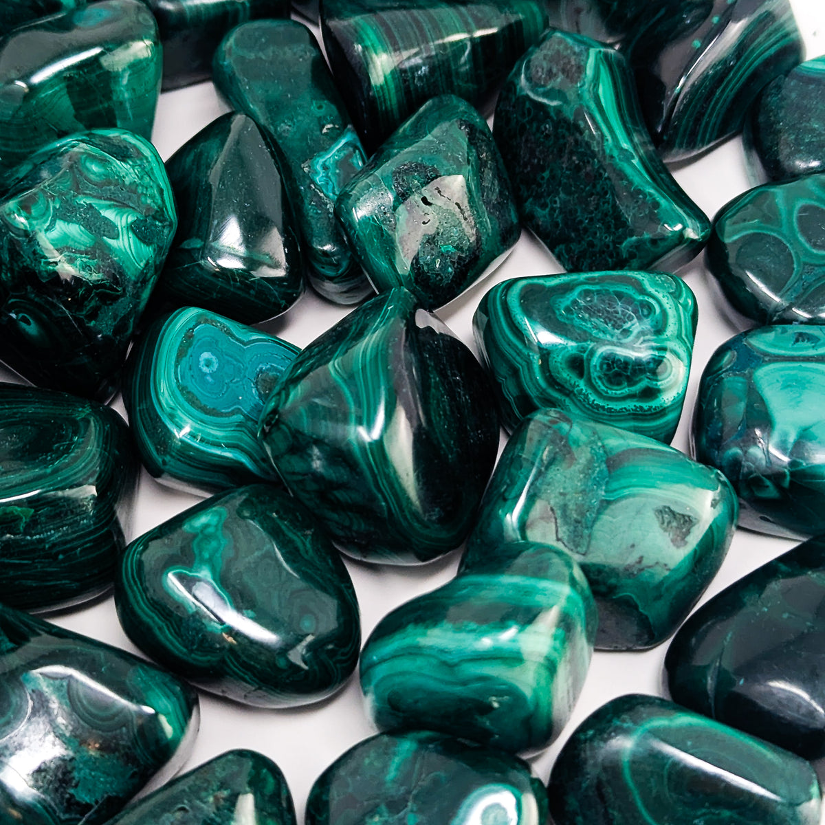 Malachite tumble, a copper carbonate.