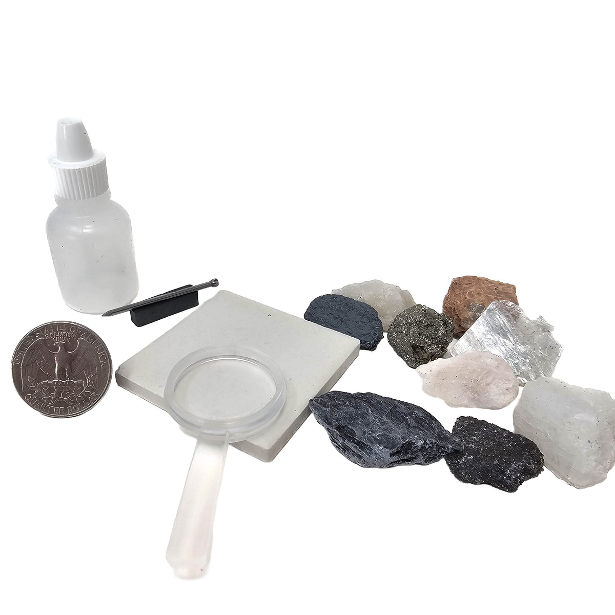 Mineral hardness test kit from the USA – kit beside a coin for scale