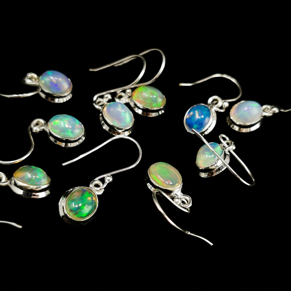 Opal Dished earring (oval) in sterling silver.