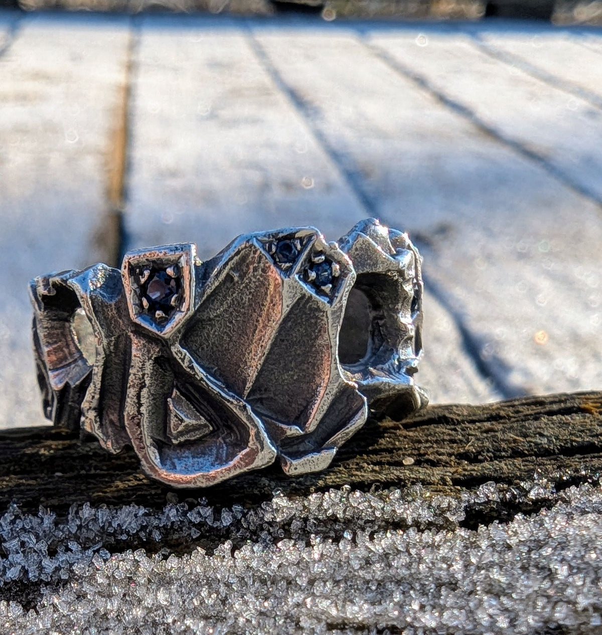 Hydrus free flow ring with Blue Sapphire.