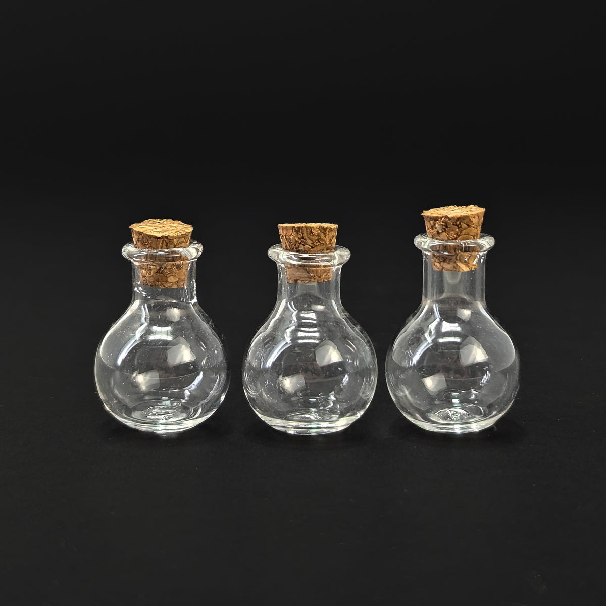 Potion Bottle display, made of cork and glass.