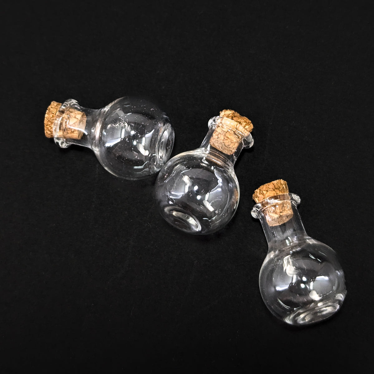 Potion Bottle display, made of cork and glass.