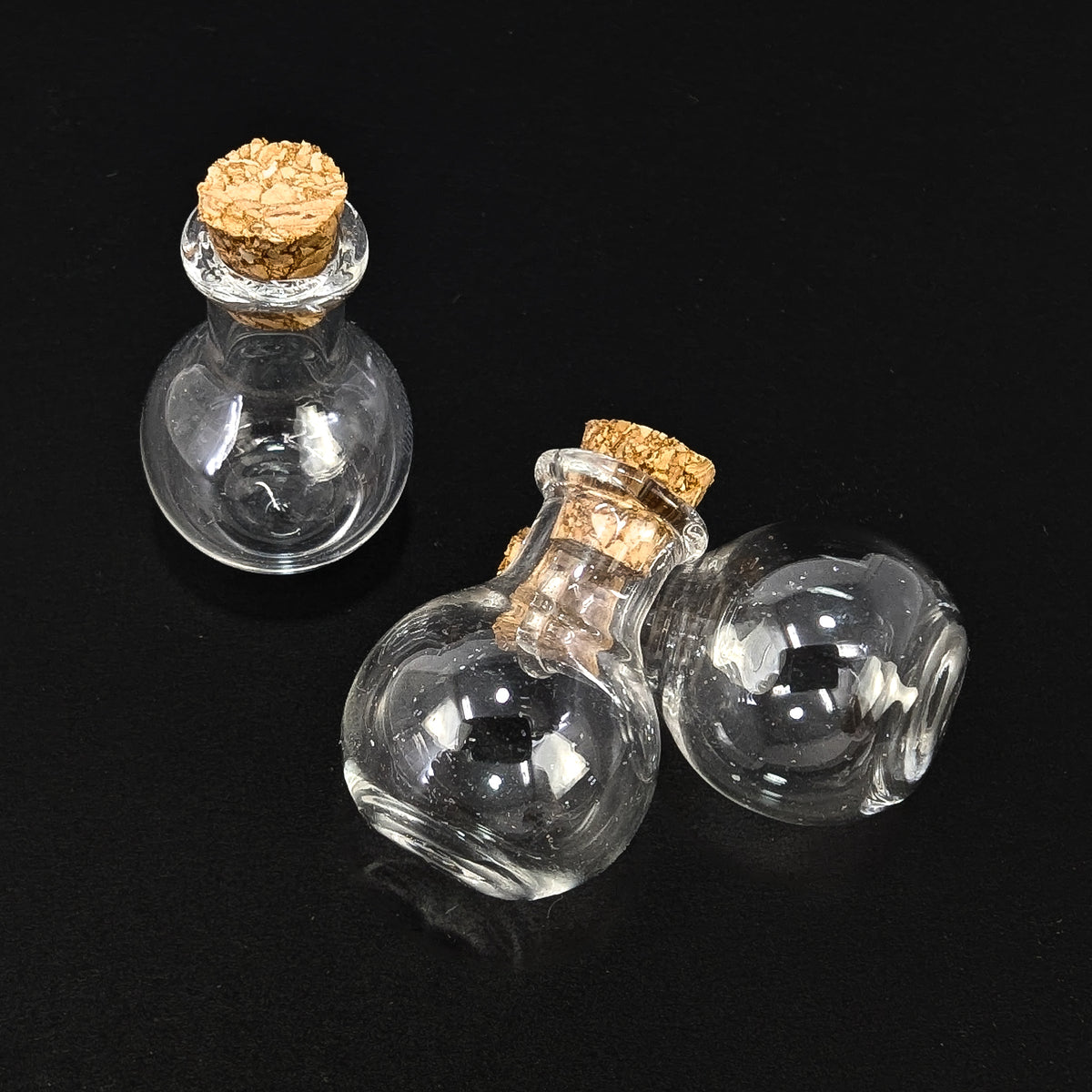 Potion Bottle display, made of cork and glass.