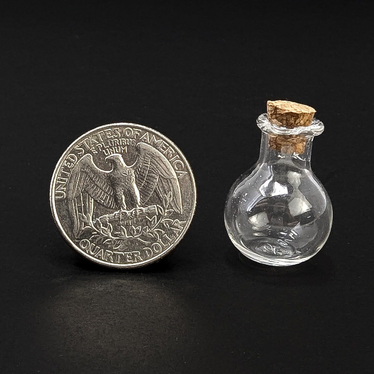 Potion Bottle display, made of cork and glass.