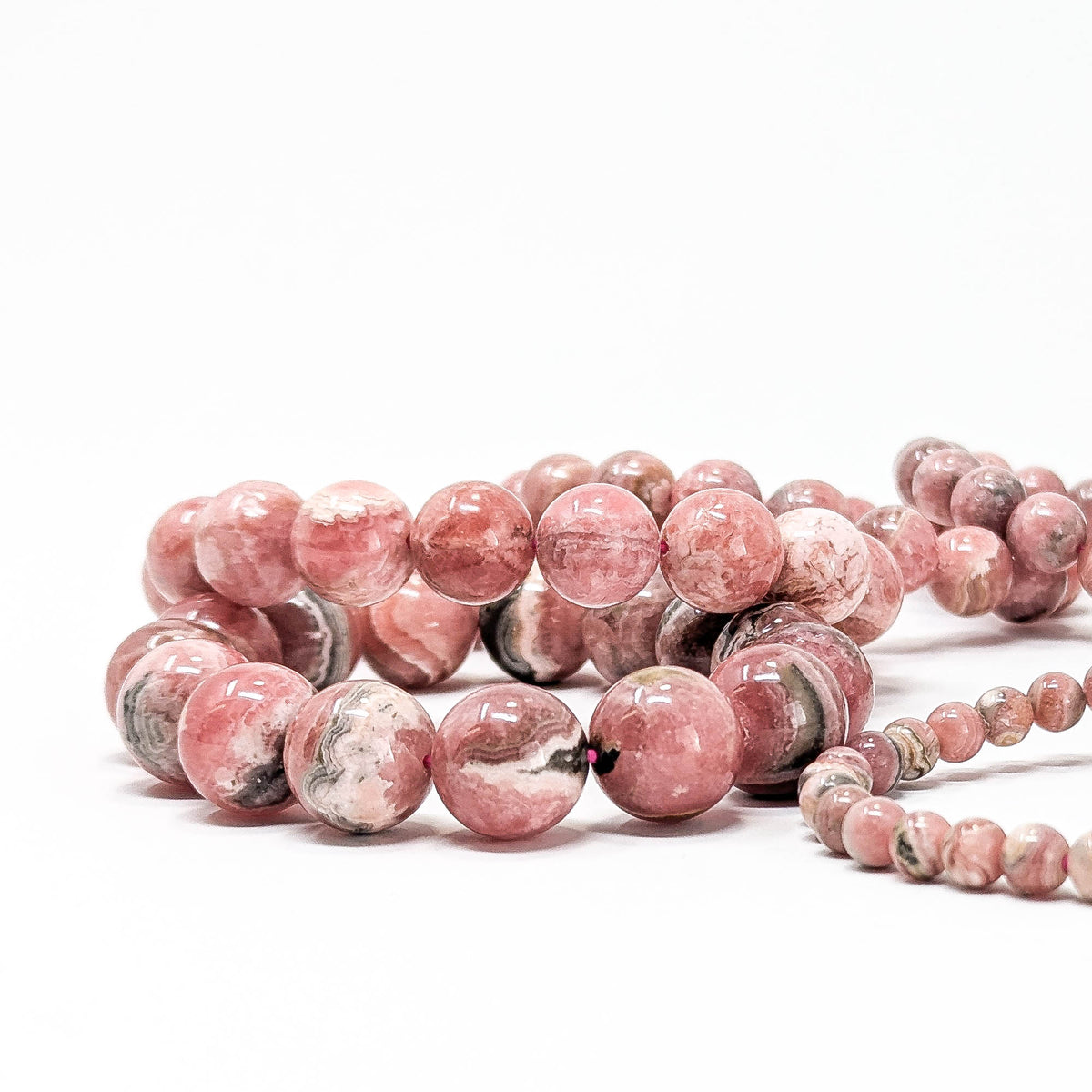 Rhodochrosite round bead bracelet – stack of bracelets