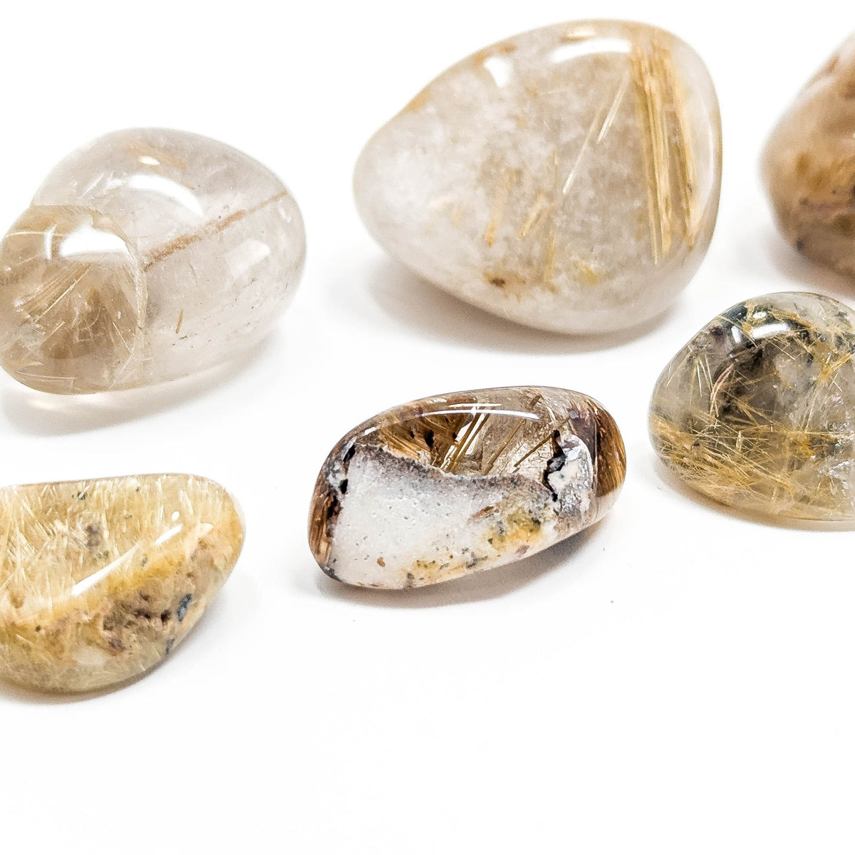 A grade rutilated quartz tumble from Brazil – four tumbles