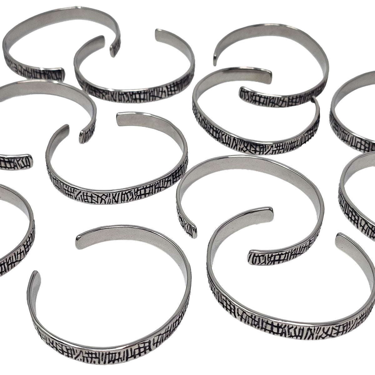 Scored Line stainless steel cuff bracelet.