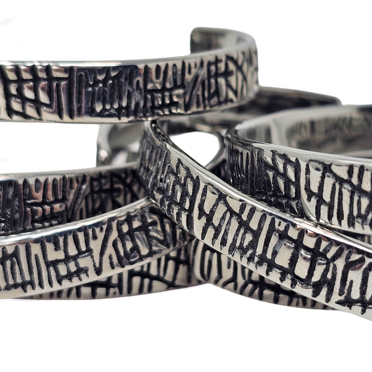 Scored Line stainless steel cuff bracelet.