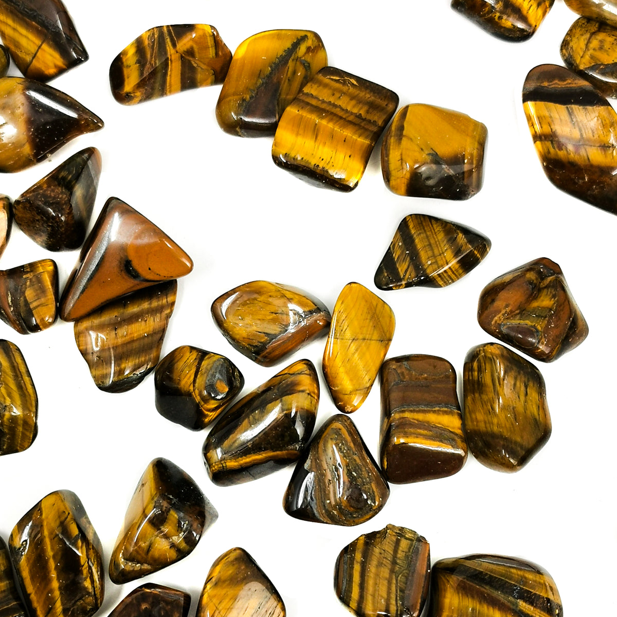 Tigers Eye tumble, a variety of quartz.