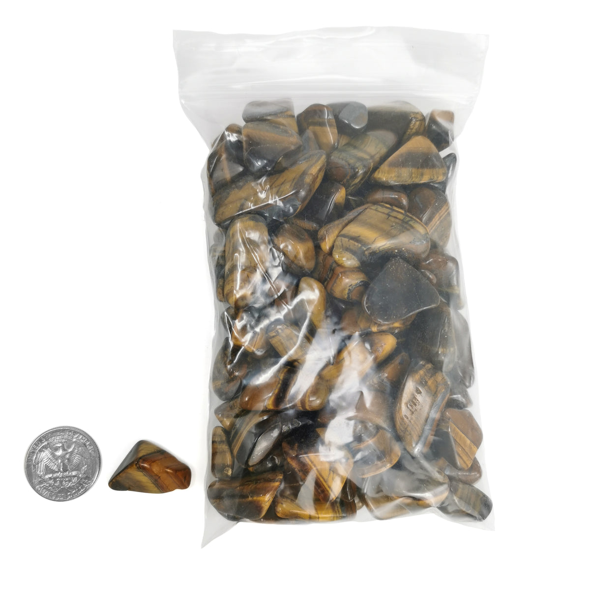 Tigers Eye tumble, a variety of quartz.