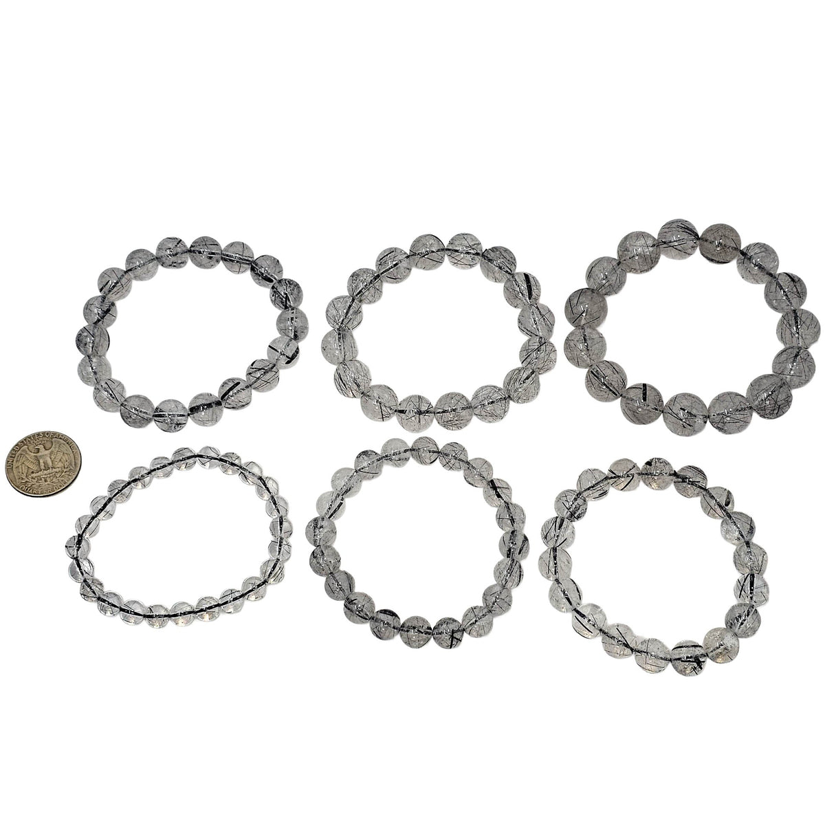 Tourmalinated Quartz round bead bracelet.