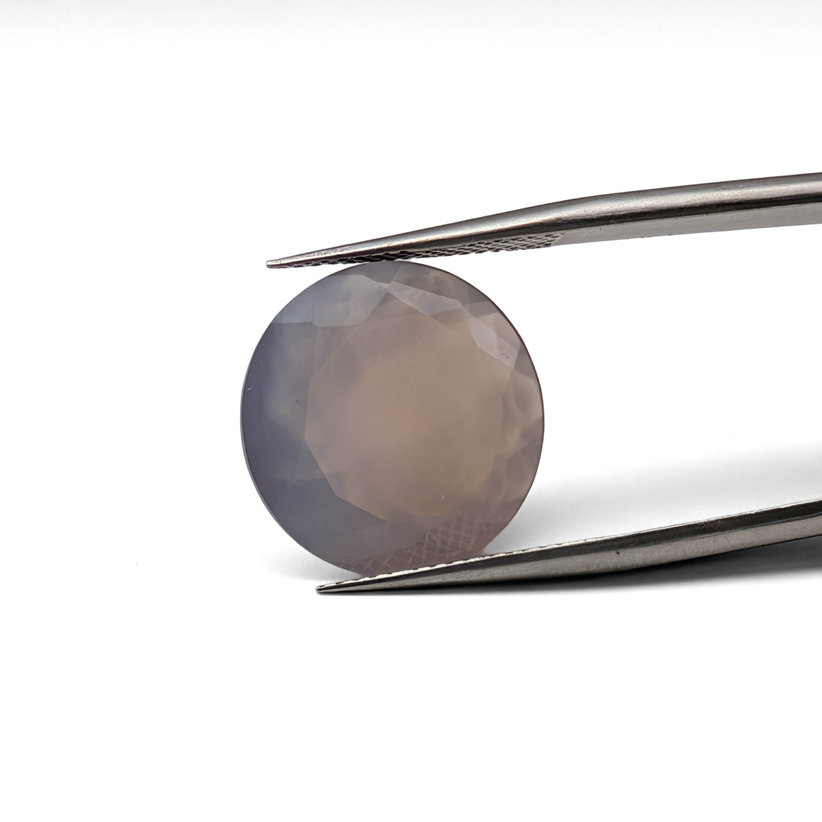 Agate faceted round brilliant gemstone, 9.68ct, from BC, Canada, held in tweezers, view 2 of 11