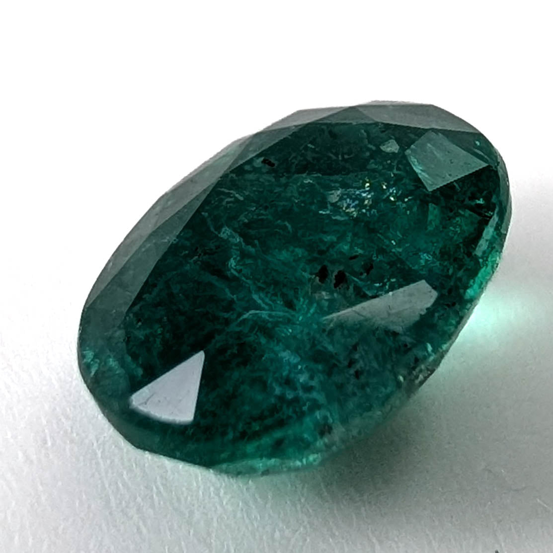 Emerald faceted oval cut gemstone, 2.45ct, alternate angle, view 9 of 18
