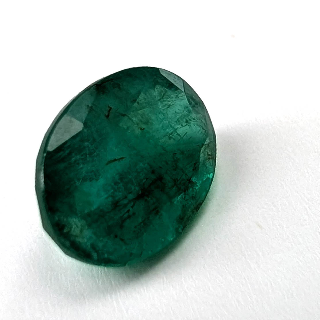 Emerald faceted oval cut gemstone, 2.53ct, alternate angle, view 7 of 13
